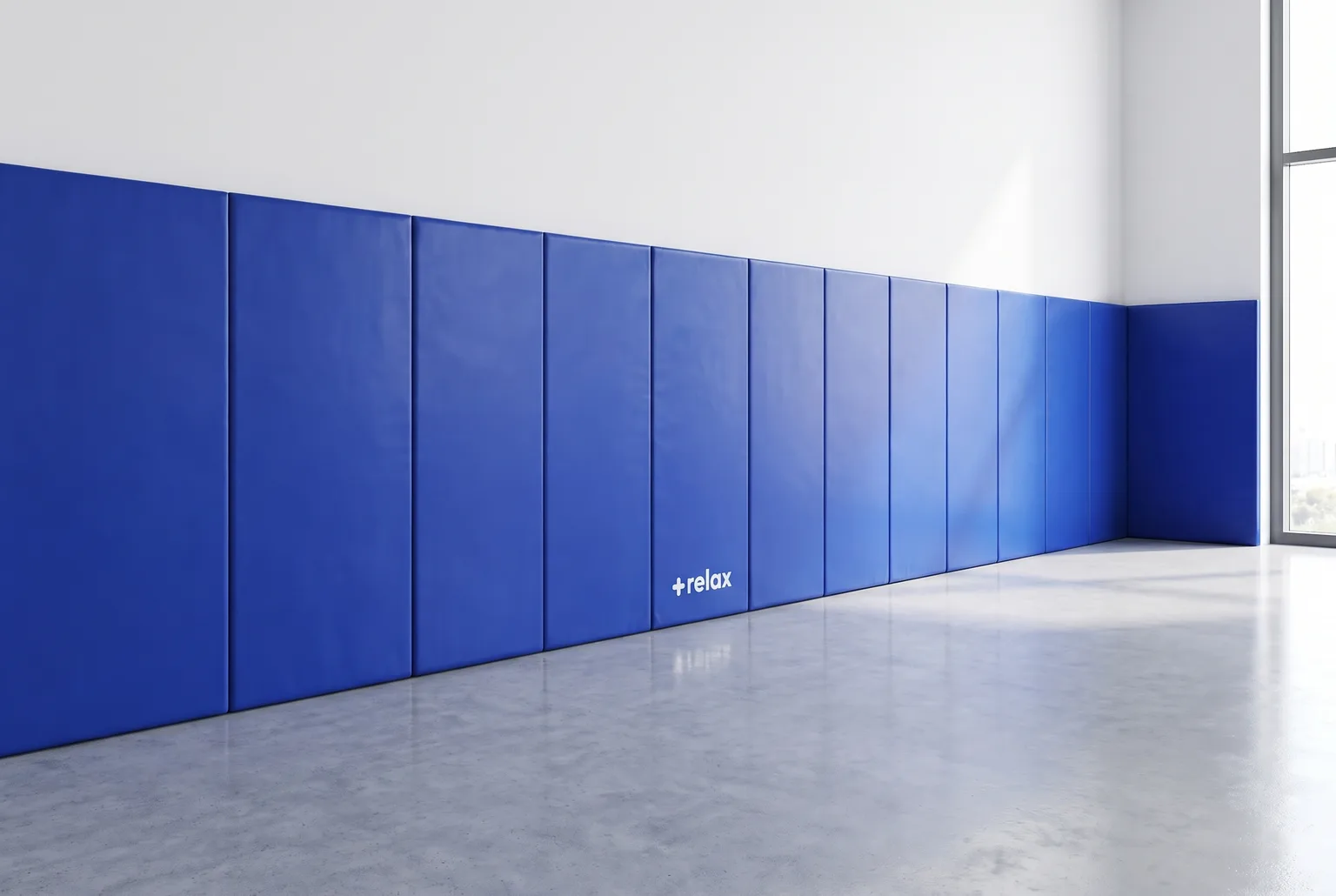 Muro de gimnasio cubierto con paneles acolchados +relax